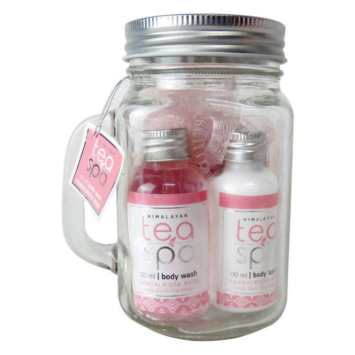 Coffret de bain avec une fleur de douche et son mug en verre